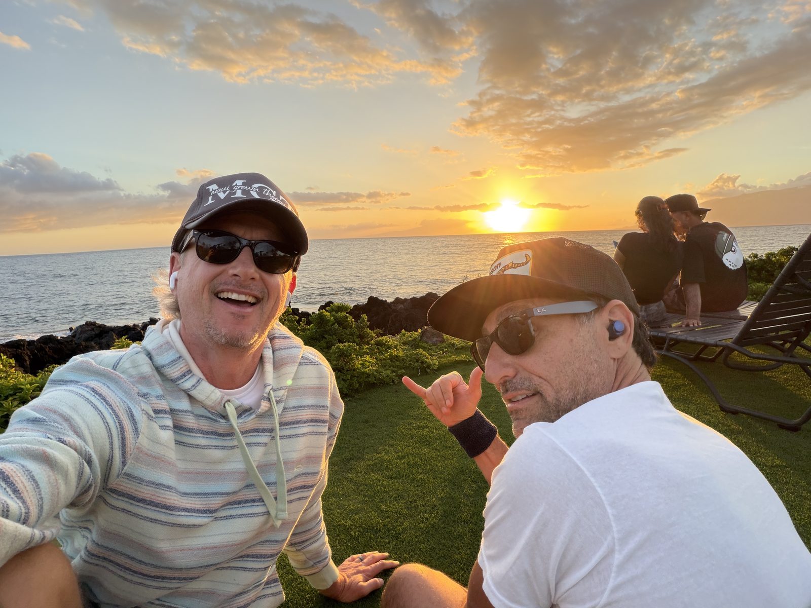 Jeff Igoe and a friend watching the sunset in Maui